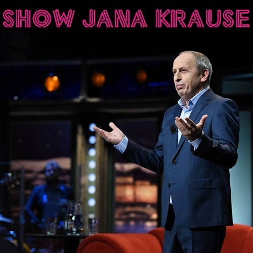 Moderátor Jan Kraus ve studiu s nápisem "Show Jana Krause". 