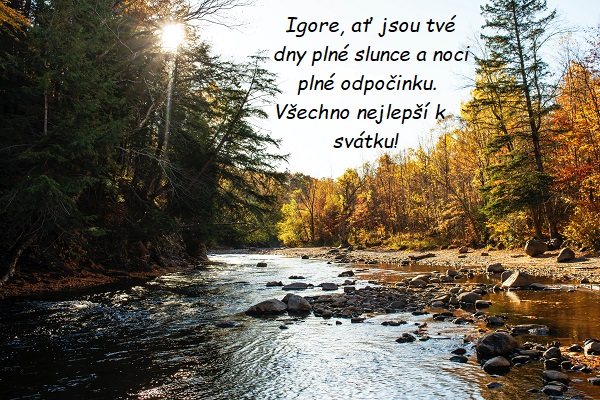 Gratulace ke jmeninám Igorovi na pozadí tekoucí řeky lemované podzimním lesem. 