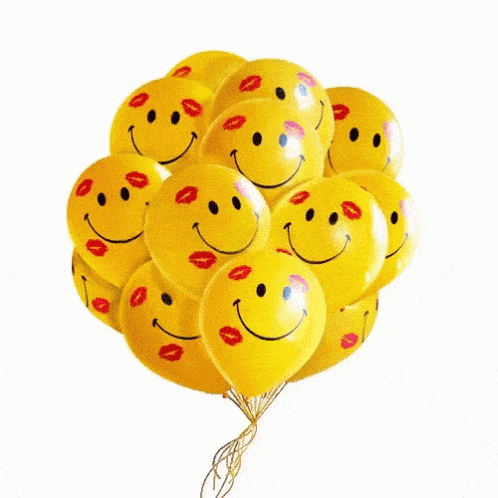 GIF přání k jmeninám s usmívajícími se balónky.